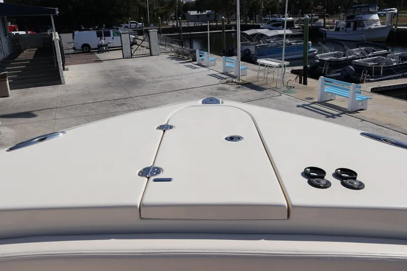  Yacht Photos Pics 2017 Grady-White Canyon 306 boat docked at marina with other vessels.