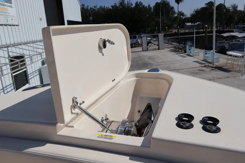  Yacht Photos Pics 2017 Grady-White Canyon 306 boat anchor compartment open at marina.