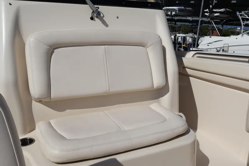  Yacht Photos Pics 2017 Grady-White Canyon 306 boat seat, beige upholstery, outdoor setting.