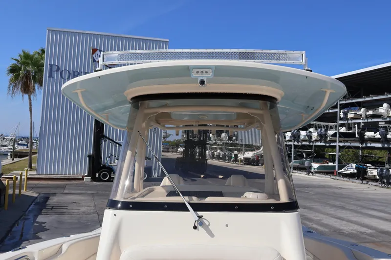  Yacht Photos Pics 2017 Grady-White Canyon 306 boat at marina with clear blue sky.
