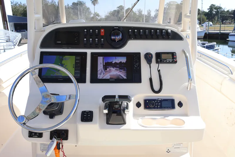  Yacht Photos Pics Control panel of a 2017 Grady-White Canyon 306 boat with navigation and communication equipment.