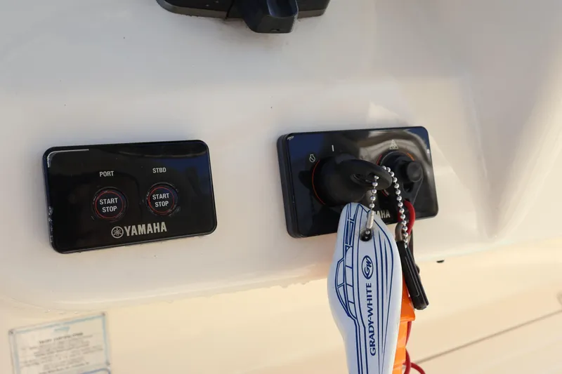  Yacht Photos Pics Yamaha start-stop controls on 2017 Grady-White Canyon 306 boat dashboard.