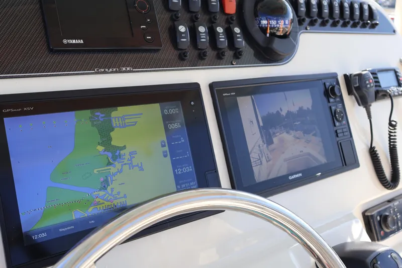  Yacht Photos Pics 2017 Grady-White Canyon 306 dashboard with GPS and navigation systems.