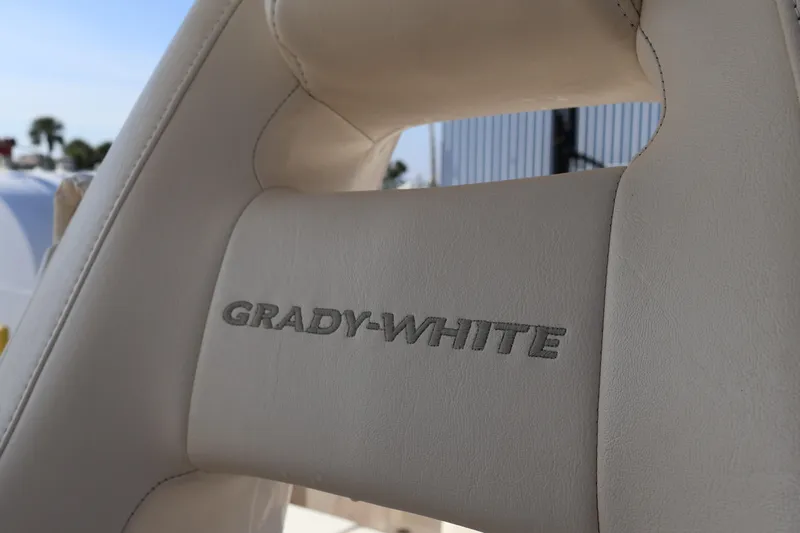  Yacht Photos Pics Grady-White Canyon 306 2017 boat seat with logo, beige upholstery.