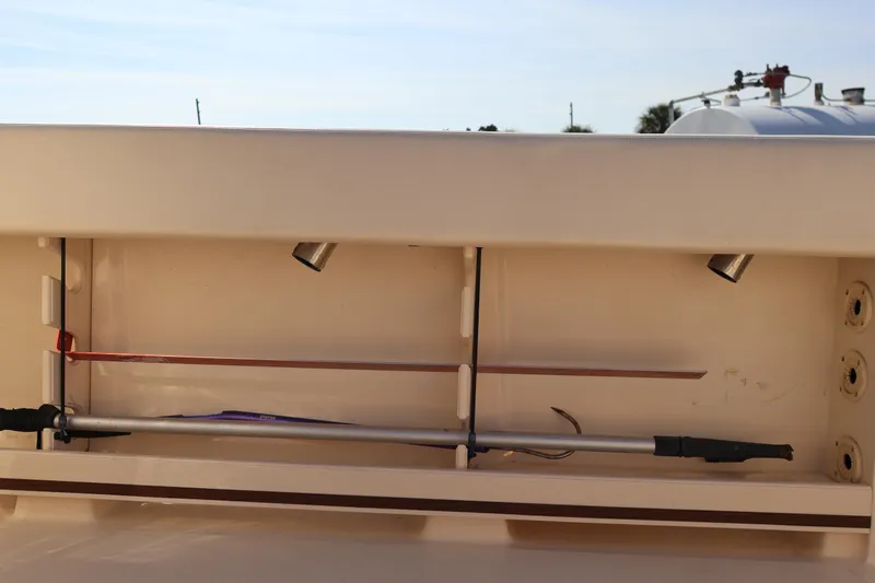  Yacht Photos Pics 2017 Grady-White Canyon 306 boat storage compartment with fishing rod holders.