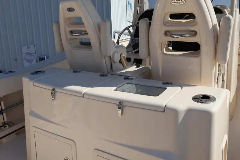  Yacht Photos Pics 2017 Grady-White Canyon 306 boat interior with seating and storage compartments.