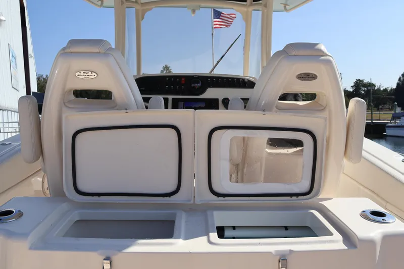  Yacht Photos Pics 2017 Grady-White Canyon 306 boat interior with seating and storage compartments.