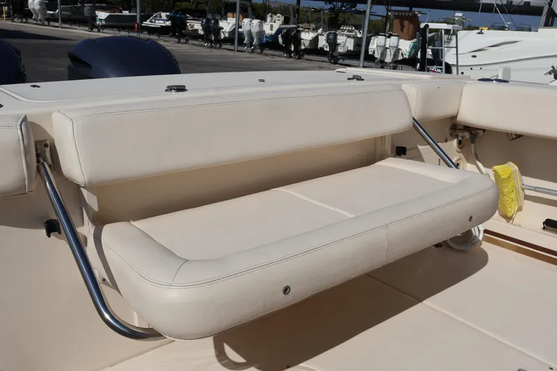  Yacht Photos Pics 2017 Grady-White Canyon 306 boat with foldable seating in the cockpit area.