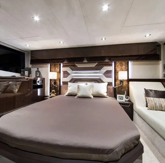  Yacht Photos Pics Luxurious bedroom interior of 2017 Galeon 500 Fly yacht with modern design and ambient lighting.