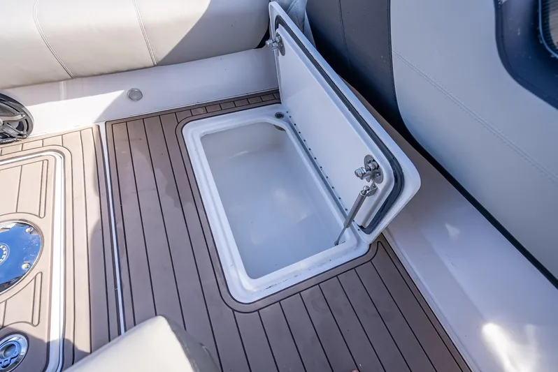 45-18 Yacht Photos Pics Open storage compartment on 2018 Nor-Tech 450 Sport boat deck.