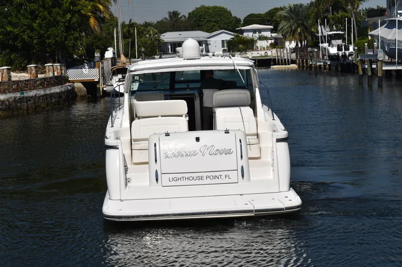 Bossa Nova Yacht Photos Pics 2006 Tiara Yachts 3600 Open cruising in a canal, Lighthouse Point, FL.