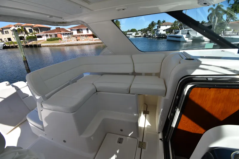 Bossa Nova Yacht Photos Pics 2006 Tiara Yachts 3600 Open interior with white seating, dockside view.