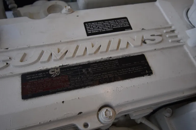 Bossa Nova Yacht Photos Pics Engine detail of a 2006 Tiara Yachts 3600 Open, showcasing Cummins branding.