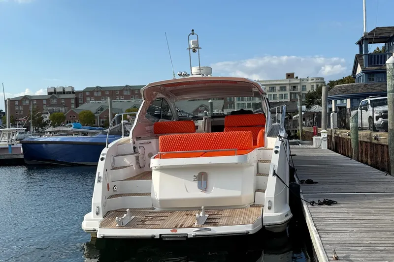  Yacht Photos Pics Azimut Atlantis 43 yacht, 2016 model, docked with vibrant orange seating.