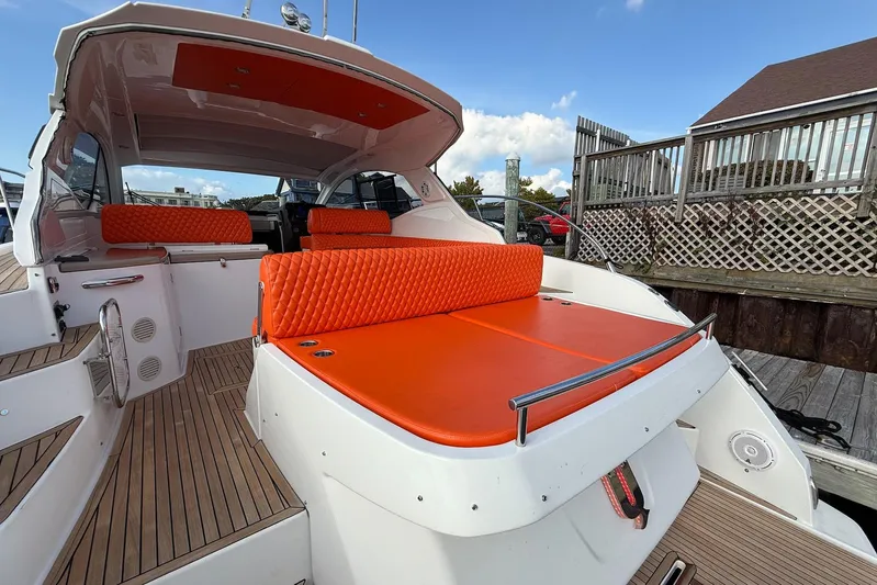  Yacht Photos Pics 2016 Azimut Atlantis 43 yacht with vibrant orange seating and sleek design.
