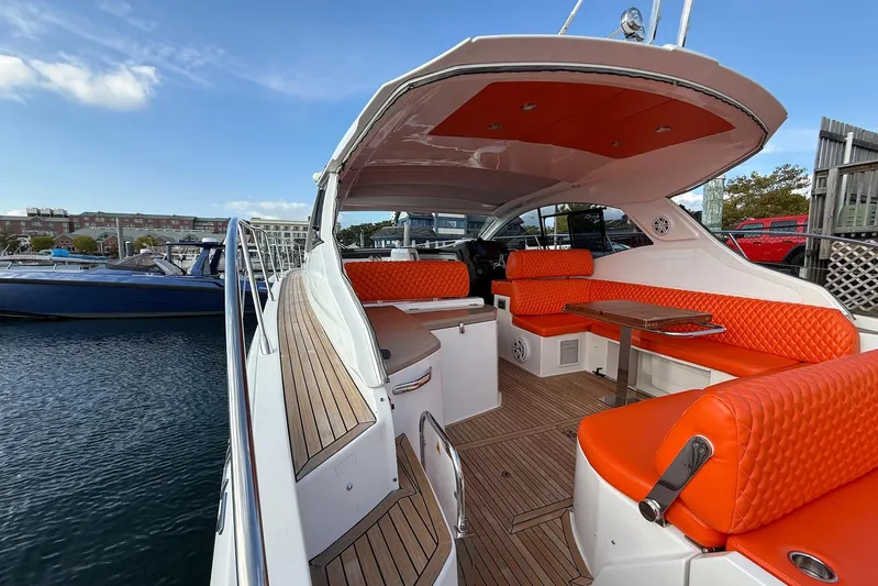  Yacht Photos Pics Luxurious 2016 Azimut Atlantis 43 yacht with vibrant orange seating and sleek design.