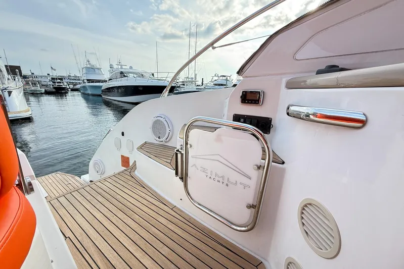  Yacht Photos Pics Azimut Atlantis 43 yacht deck, 2016 model, docked at marina with other boats.
