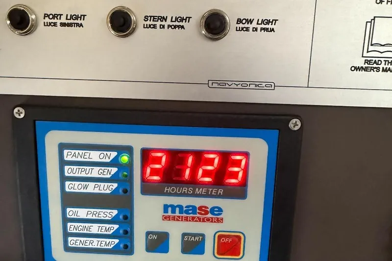  Yacht Photos Pics Control panel of a 2016 Azimut Atlantis 43 with hours meter and light switches.