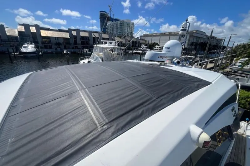  Yacht Photos Pics Azimut Atlantis 43 yacht, 2020 model, docked at marina with clear blue sky.