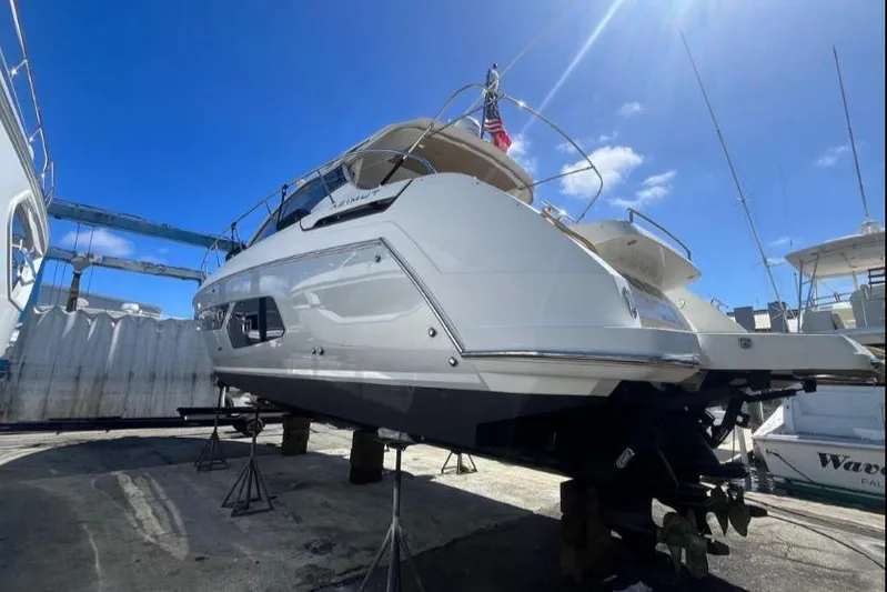  Yacht Photos Pics 2020 Azimut Atlantis 43 yacht on dry dock under clear blue sky.