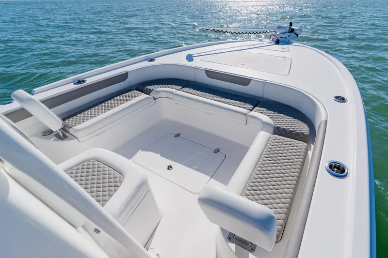  Yacht Photos Pics 2022 Caymas 28 HB boat with spacious seating on calm water.