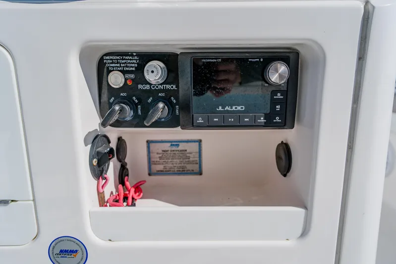 Yacht Photos Pics Control panel of 2022 Caymas 28 HB boat with JL Audio system and RGB controls.