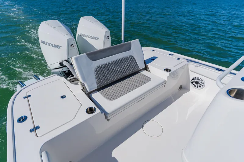  Yacht Photos Pics 2022 Caymas 28 HB boat with dual Mercury engines on open water.