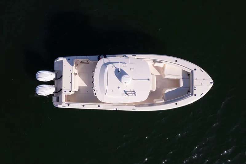 Shooter Yacht Photos Pics 2022 Grady-White 30.6 Canyon boat, aerial view, on dark water.