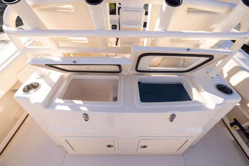 Shooter Yacht Photos Pics 2022 Grady-White 30.6 Canyon boat storage compartments and rod holders.