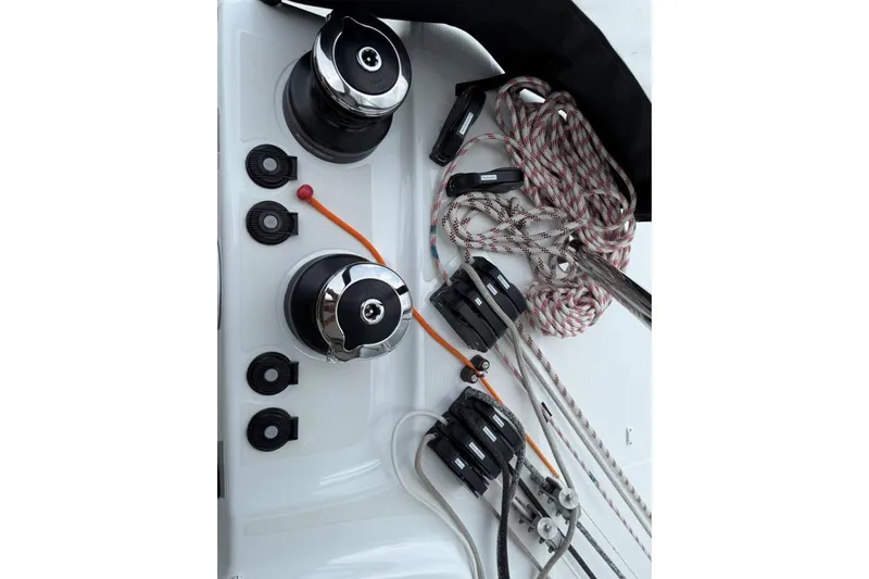 Tomcat Yacht Photos Pics Sailing equipment on 2023 Lagoon 46 catamaran, featuring winches and ropes.