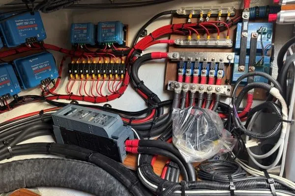 Tomcat Yacht Photos Pics Electrical system of a 2023 Lagoon 46 yacht, featuring wiring and components.