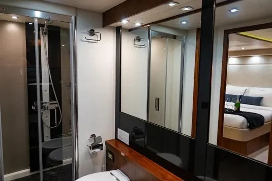 Catch The Wave Yacht Photos Pics Luxurious bathroom in 2013 Sunseeker Manhattan 73 yacht, featuring modern shower and elegant design.