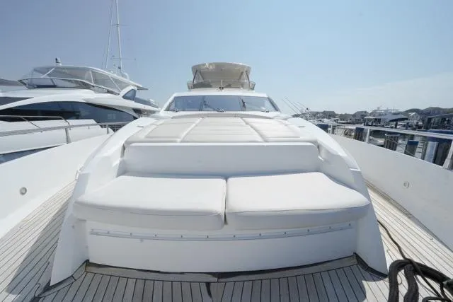 Catch The Wave Yacht Photos Pics 2013 Sunseeker Manhattan 73 yacht with spacious deck and luxurious seating.