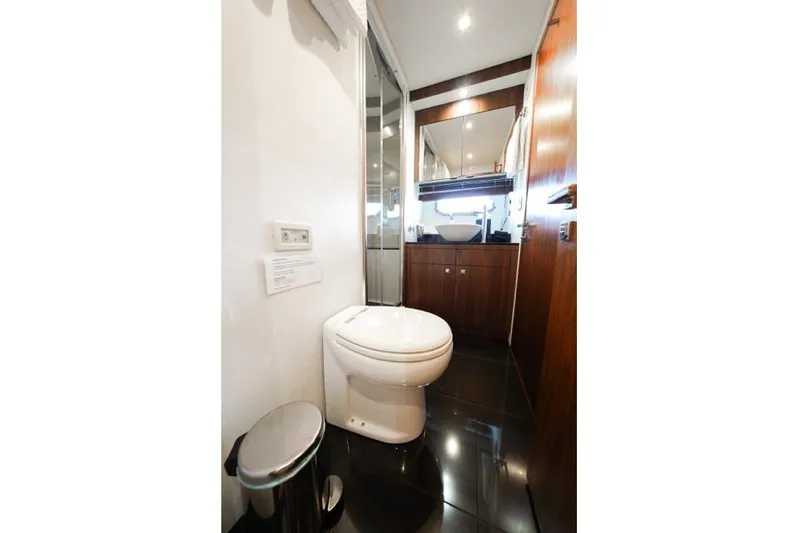 Catch The Wave Yacht Photos Pics Luxurious bathroom in 2013 Sunseeker Manhattan 73 yacht with modern fixtures and elegant design.