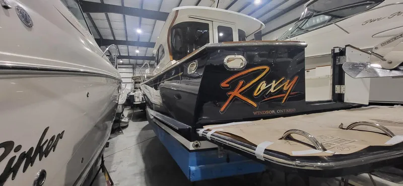  Yacht Photos Pics 2022 Legacy 36 boat named "Roxy" in indoor storage, Windsor, Ontario.