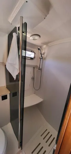  Yacht Photos Pics 2022 Legacy 36 yacht bathroom with modern shower and sleek design.