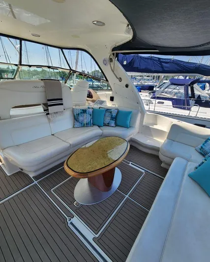  Yacht Photos Pics Luxurious 2004 Sea Ray Sundancer 460 yacht interior with plush seating and elegant decor.