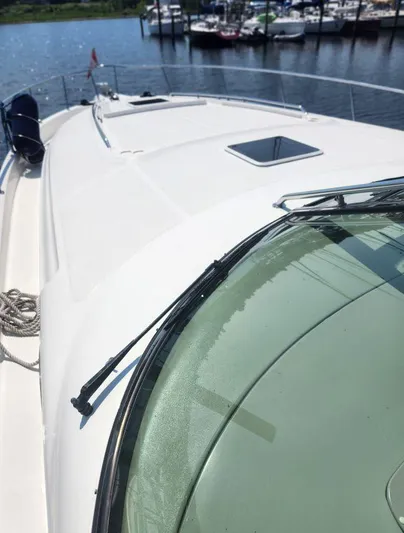  Yacht Photos Pics 2004 Sea Ray Sundancer 460 yacht deck with marina view.