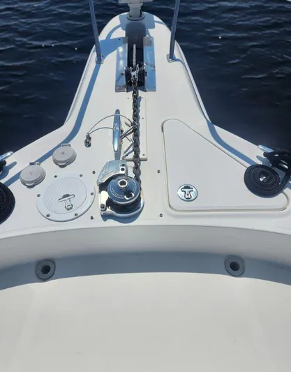  Yacht Photos Pics Bow of 2004 Sea Ray Sundancer 460 with anchor chain and marine equipment.