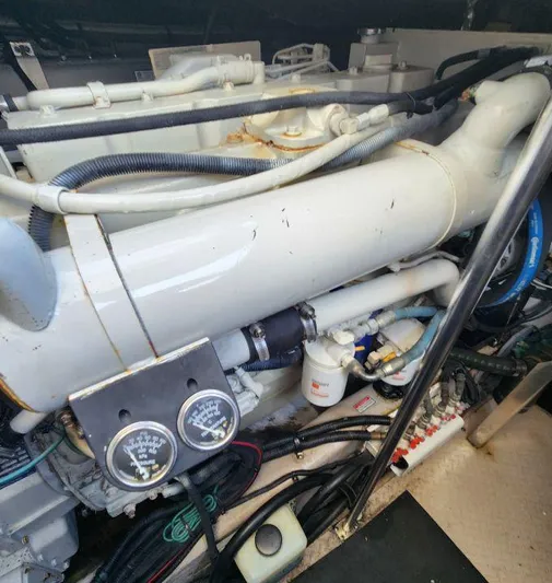  Yacht Photos Pics Engine compartment of a 2004 Sea Ray Sundancer 460 yacht, showcasing mechanical components.