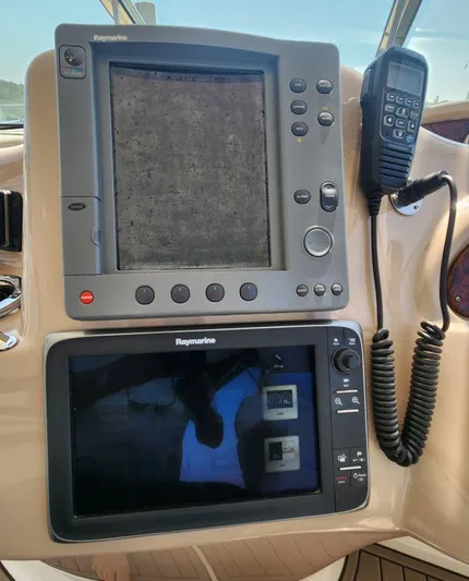  Yacht Photos Pics Raymarine navigation equipment on 2004 Sea Ray Sundancer 460 yacht dashboard.