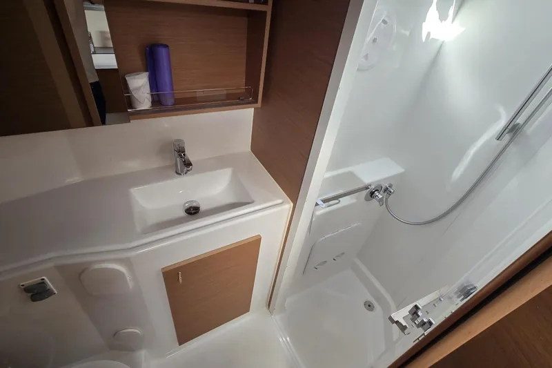  Yacht Photos Pics Modern bathroom in 2025 Excess 14 yacht with sink and shower.