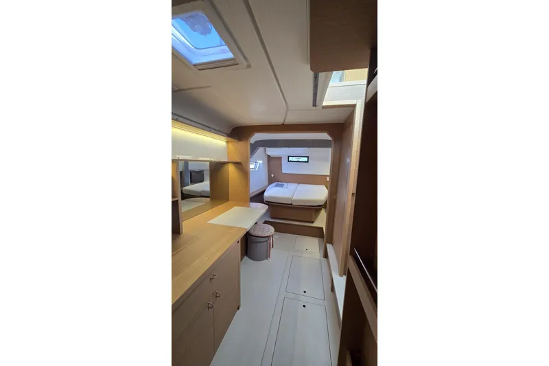  Yacht Photos Pics Luxurious interior of 2025 Excess 14 yacht, featuring modern design and comfortable sleeping area.