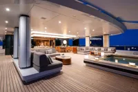 Luxurious 2022 Amels Custom yacht deck with elegant seating and ambient lighting.