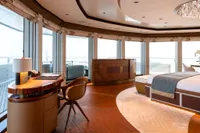 Luxurious 2022 Amels Custom yacht interior with elegant furnishings and panoramic windows.