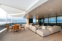 Luxurious 2022 Amels Custom yacht deck with modern seating and ocean view.