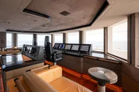 Luxurious Amels Custom 2022 yacht bridge with modern navigation equipment and panoramic ocean views.