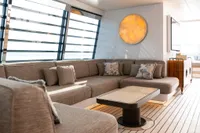 Luxurious 2022 Amels Custom yacht interior with elegant seating and modern decor.