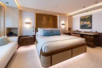 Luxurious 2022 Amels Custom yacht bedroom with elegant decor and modern furnishings.