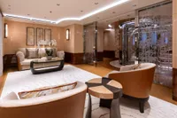 Luxurious interior of 2022 Amels Custom yacht with elegant seating and modern decor.